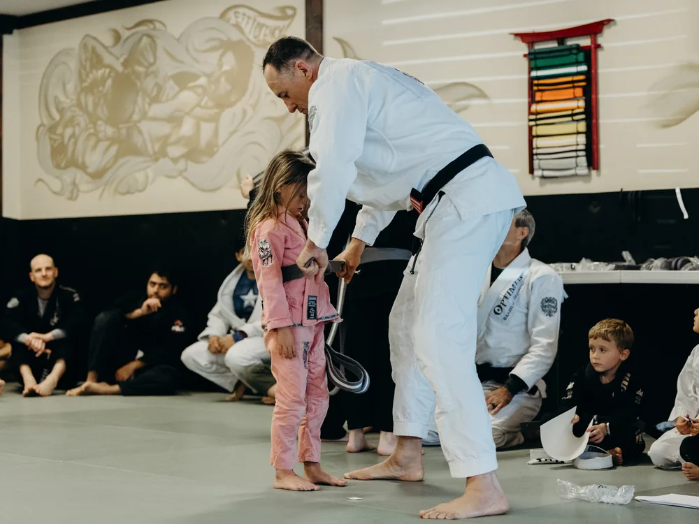 Professor Collins working with a young student